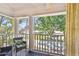 Inviting front porch with brick flooring and comfortable seating offers a relaxing outdoor space at 4309 W Robin Ln, Tampa, FL 33609