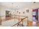 Hallway with chandelier and hardwood floors at 4309 W Robin Ln, Tampa, FL 33609
