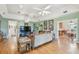 Living room displaying hardwood floors, natural light, and backyard access at 4309 W Robin Ln, Tampa, FL 33609