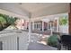 Outdoor patio with a large counter with a sink and a grill with access to the house at 4309 W Robin Ln, Tampa, FL 33609