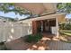 Outdoor kitchen area with grill, sink, and counter space, perfect for alfresco dining at 4309 W Robin Ln, Tampa, FL 33609
