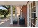 Charming brick patio with comfortable seating and ample space for outdoor entertaining at 4309 W Robin Ln, Tampa, FL 33609
