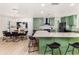 Spacious kitchen with a large island, granite countertops, breakfast bar, and a dining area nearby at 4507 Fox Hunt Dr, Tampa, FL 33624