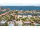 Aerial view of property in residential area with waterfront, pool, and established landscaping at 4531 44Th S St, St Petersburg, FL 33711