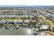 Expansive aerial view of waterfront homes, canals, and boat docks in a vibrant community at 4531 44Th S St, St Petersburg, FL 33711