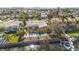 Home's backyard oasis featuring a private pool, palm trees, and direct access to a canal at 4531 44Th S St, St Petersburg, FL 33711