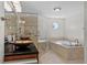 Spa-like bathroom featuring large vanity and soaking tub at 4531 44Th S St, St Petersburg, FL 33711