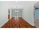 Charming dining room with hardwood floors and stylish chandelier at 4531 44Th S St, St Petersburg, FL 33711