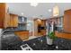 Well-equipped kitchen boasts stainless steel appliances, dark countertops, ample storage and a modern design at 4531 44Th S St, St Petersburg, FL 33711