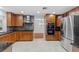 Spacious kitchen featuring stainless steel appliances, double ovens, granite countertops, and modern cabinetry at 4531 44Th S St, St Petersburg, FL 33711