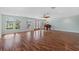 Spacious living room featuring hardwood floors and natural light from multiple windows at 4531 44Th S St, St Petersburg, FL 33711