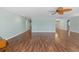 Expansive living area with laminate flooring and neutral paint, ready for your personal touches at 4531 44Th S St, St Petersburg, FL 33711