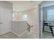Spacious hallway with staircase and adjacent computer room at 4730 Wandering Way, Wesley Chapel, FL 33544