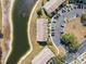 Townhouses next to a dark body of water, with lots of parking available at 5084 Misty Canal Pl, Bradenton, FL 34203