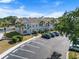 View of a row of townhomes with parking at 5084 Misty Canal Pl, Bradenton, FL 34203