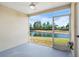 Covered patio with screens offers peaceful water views at 5084 Misty Canal Pl, Bradenton, FL 34203