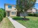 Expansive backyard with lush green grass, mature landscaping, and a screened in patio at 5409 Fishhawk Ridge Dr, Lithia, FL 33547