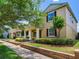 Attractive home featuring a welcoming front porch, neutral exterior, and tidy landscaping at 5409 Fishhawk Ridge Dr, Lithia, FL 33547