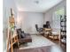 Cozy office space with hardwood floors, a comfortable futon, and large window at 5409 Fishhawk Ridge Dr, Lithia, FL 33547