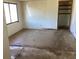 Empty living room with a window and an empty closet at 5700 65Th N Ave, Pinellas Park, FL 33781