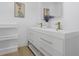 Stylish bathroom with double vanity, modern fixtures, and minimalist design at 6321 Balboa Ln, Apollo Beach, FL 33572