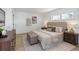 Cozy bedroom featuring a comfortable bed, neutral decor, and ample natural light at 6321 Balboa Ln, Apollo Beach, FL 33572
