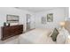 Bright bedroom featuring a cozy bed, modern decor, and lots of natural light at 6321 Balboa Ln, Apollo Beach, FL 33572