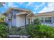 Charming single-story home with well-manicured landscaping and inviting front porch at 6321 Balboa Ln, Apollo Beach, FL 33572
