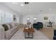 Spacious living room with open floor plan, stylish furniture, and modern decor at 6321 Balboa Ln, Apollo Beach, FL 33572