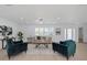 Bright living room with comfortable seating, modern decor, and natural light at 6321 Balboa Ln, Apollo Beach, FL 33572