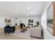 Spacious living room featuring modern furniture, neutral tones, and stylish decor at 6321 Balboa Ln, Apollo Beach, FL 33572