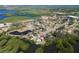 A high aerial view showing the home's close proximity to lakes and other natural environments at 6908 11Th E Ave, Palmetto, FL 34221