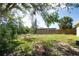 An expansive backyard with trees and vegetation providing natural beauty and privacy at 6908 11Th E Ave, Palmetto, FL 34221