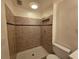 Tiled walk-in shower in a clean bathroom at 718 Paris S Ave, St Petersburg, FL 33701