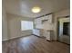 Bright kitchenette featuring white cabinetry and tile flooring at 718 Paris S Ave, St Petersburg, FL 33701
