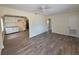 Open floor plan showcases a spacious living area with kitchen access at 718 Paris S Ave, St Petersburg, FL 33701