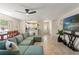 Comfortable living area with tile flooring and ample space for entertaining guests at 7203 55Th N Ave, St Petersburg, FL 33709
