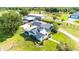 Aerial view features a home with well-maintained landscaping, lawn and fencing at 812 Jameson Rd, Lithia, FL 33547