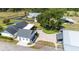 Aerial view features a home with outdoor seating area, well kept lawns and landscaping at 812 Jameson Rd, Lithia, FL 33547
