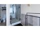 Stylish bathroom with a glass shower, pebble floor, and modern fixtures, offering a spa-like experience at 812 Jameson Rd, Lithia, FL 33547