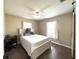 Neutral bedroom with white furniture, ceiling fan, and tiled floors at 812 Jameson Rd, Lithia, FL 33547