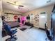 A bedroom featuring a ceiling fan, a window, and tile floors at 812 Jameson Rd, Lithia, FL 33547