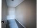 A walk-in closet featuring tile floors, baseboards, and walls at 812 Jameson Rd, Lithia, FL 33547