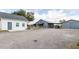 Property featuring a charming barn and workshop area, providing ample space for hobbies and storage at 812 Jameson Rd, Lithia, FL 33547