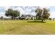 Attractive home with large, fenced yard, lush lawn, and classic architectural details at 812 Jameson Rd, Lithia, FL 33547