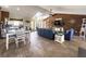 Spacious living room with tile floors, vaulted ceilings, and view of dining area and kitchen at 812 Jameson Rd, Lithia, FL 33547