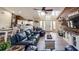 Open-concept living room with dining, kitchen, and hardwood floors at 812 Jameson Rd, Lithia, FL 33547