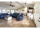 Open living room with tile flooring, vaulted ceilings and a view into the eat-in kitchen at 812 Jameson Rd, Lithia, FL 33547