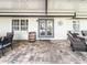 A covered outdoor patio with a seating area and a barrel at 812 Jameson Rd, Lithia, FL 33547
