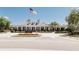 The clubhouse features beautiful landscaping and a welcoming facade with columns at 8338 Old Town Dr, Tampa, FL 33647